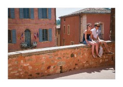 Sitting on the Wall above the Town Square