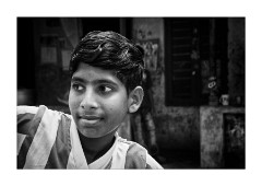 Young Boy Outside his Home