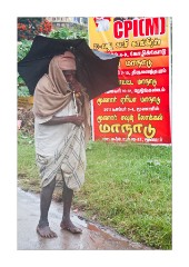 Elderly Man Struggling in the Rain