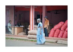 Another Person outside the shop