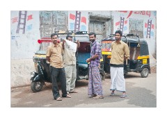 Taxi Drivers with their Tut Tut Taxis