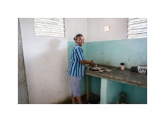 Trinidad Countryside Cuba 69  Manaca Iznaga - Visiting this womans house which is very poor but clean and tidy - The Kitchen