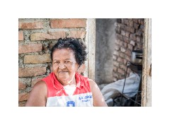 Trinidad Countryside Cuba 71  Manaca Iznaga This woman sitting while her dinner cooks and her house is being built