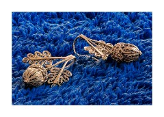 Macro Photo Stacking - Maltese Earrings  To get the earrings this size, and all in focus, 10 photographs were taken and then merged by photo stacking