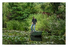 France Giverny 22  Claude Monet's Lily Pond Clearing the Pond