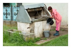 Copsa Mare 20  Evening visit to Copsa Mare starting in the gypsy street, local collecting water