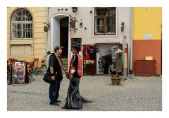 Sighisoara 02  The Citadel Square - Chimney sweep and cleaner in conversation