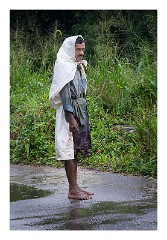 Kandy 61  Man watching the women work