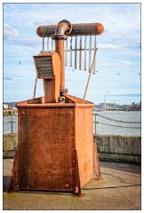 London Docklands 44  Flood Tidal Sonification - The floodtide listening post makes music determind by the tide of the Thames.  A sensor submerged from the pier of Trinity Bouy Wharf reads tidal flow data which is converted into notation and played by the listening post.