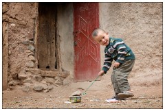 Imlil Valley, Atlas Mountains 24  Local boy happily playing in the front yard