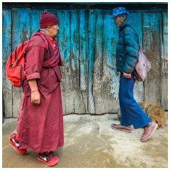 04 Leh and its Valley  People Passing a Blue Door