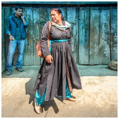 05 Leh and its Valley  People Passing a Blue Door