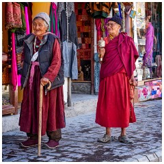 21 Leh and its Valley  Following her with his Prayer Wheel