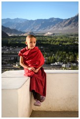 02 Thiksey and Likir Monasteries  Thiksey Monastery - Little boy Sitting way Above the Valley Below