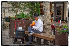 Aigues Mortes 09  Musician in the Square