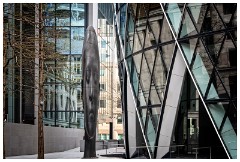 34 London in April  The monolithic head, known as Laura by Jaume Plensa. It resembles an Easter Island head that's been forced into a gherkin-shaped mould, appropriate given the location beneath the Gherkin.