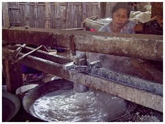 Bagan 18  Machine Extruding the Noodle Paste into Noodles into the Boiling Water