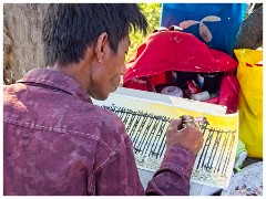 Mandalay 17  Artist working on the U-Bein Bridge
