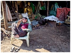 Mandalay 40  Worker Resting at the Workplace of Statues
