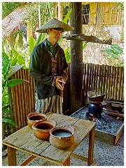 Luang Prabang Day 3 16  The Living Land Farm - Cooking the Sticky Rice