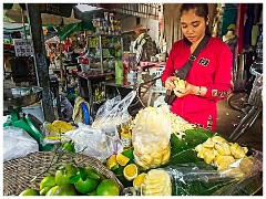 Siem Reap Day Four 07  Peeling Fruit for Sale