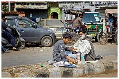 India Delhi 23  A Shave in the Middle of the Road in Old Delhi