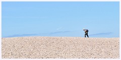 010 Chesil Beach  Ann walking to the Summit of Chesel Beach
